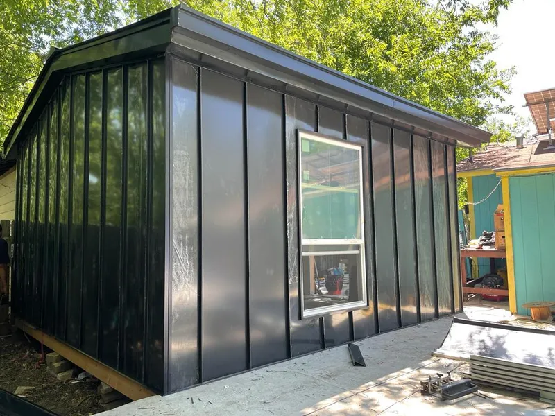 Black standing seam metal wall panels for Metal Roof Installation in Rogersville