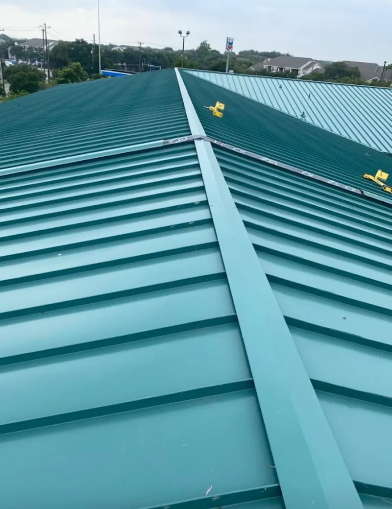 Green commercial metal roof ridge and valley for Metal Roof Repair in Rogersville
